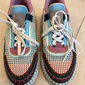 CHLOÉ
Nama embroidered suede and recycled-mesh sneakers